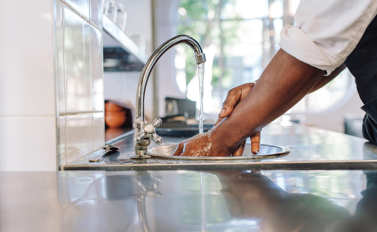 Food safety experts say washing your hands after you've handled a recalled food product is important. (Photo: Getty Creative)