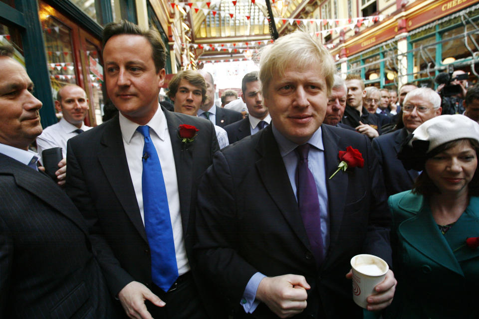 Conservative Party leader David Cameron and the Mayor of London Boris Johnson celebrate St George's Day at Leadenhall Market in the City of London. PRESS ASSOCIATION Photo. Picture date: Friday April 23, 2010. See PA story ELECTION Tories. Photo credit should read: Johnny Green/PA Wire 