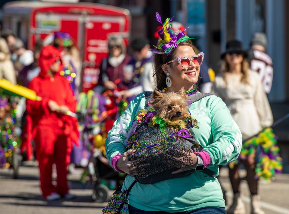 Dogs and there owners show off their stuff during the First annual Pensacola Pawdi Gras in Downtown Pensacola. The festivities included adoption runway show, costume contest, pet parade, food and more.