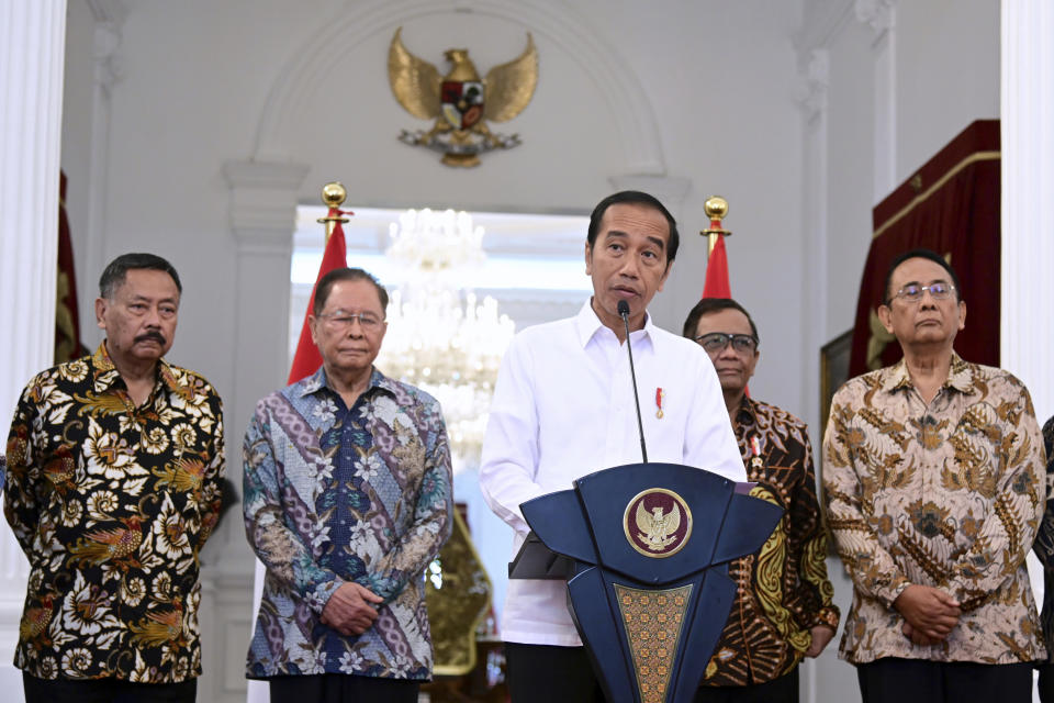 In this photo released by the Press and Media Bureau of the Indonesian Presidential Palace, Indonesian President Joko Widodo, center, delivers a speech at the Merdeka Palace in Jakarta, Indonesia, Wednesday, Jan. 11, 2023. Widodo admitted that serious human rights violations had occurred across the nation in the past, pledged to compensate the victims and their families and vowed it will not happen again in the future.(Muchlis Jr/Indonesian Presidential Palace via AP)