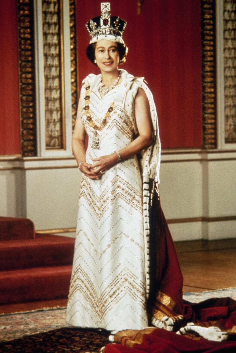 Queen Elizabeth II poses for a silver jubilee portrait in the Throne Room of Buckingham Palace, 6th February 1977