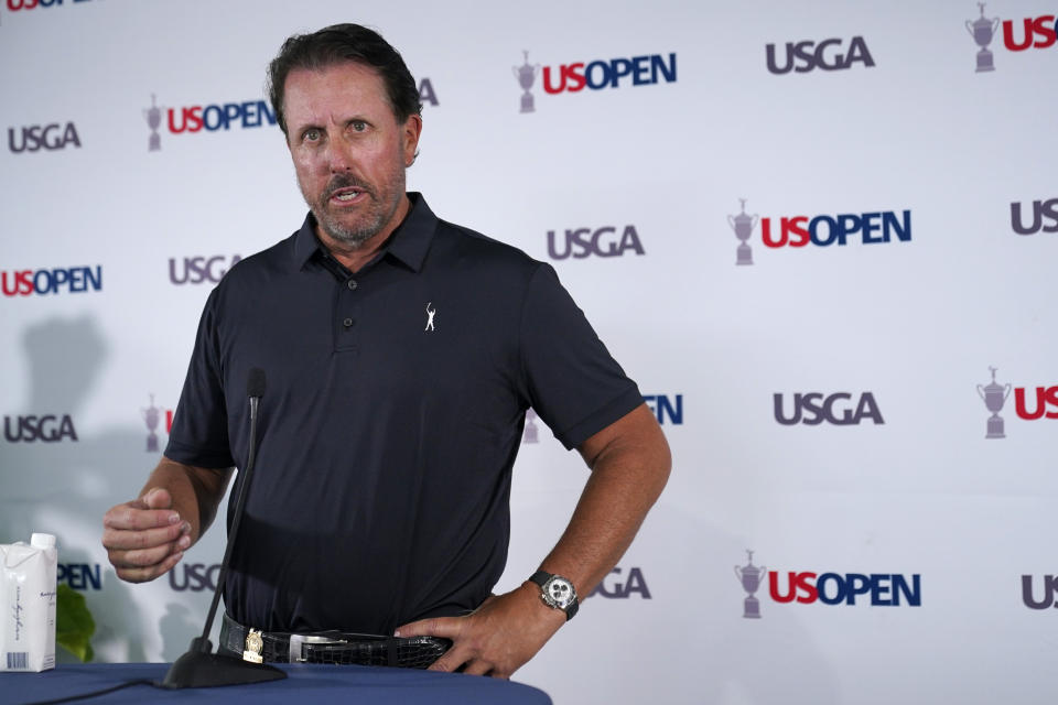 Phil Mickelson responds to a question at a press conference, Monday, June 13, 2022, at The Country Club in Brookline, Mass., ahead of the U.S. Open golf tournament. (AP Photo/Robert F. Bukaty)