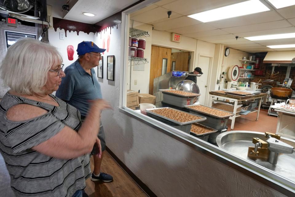 David and Gale Smith visit the Angell & Phelps Chocolate Factory for a Valentine's Day treat in Daytona Beach. After 36 years of marriage, chocolate has figured heavily into their relationship, they said.