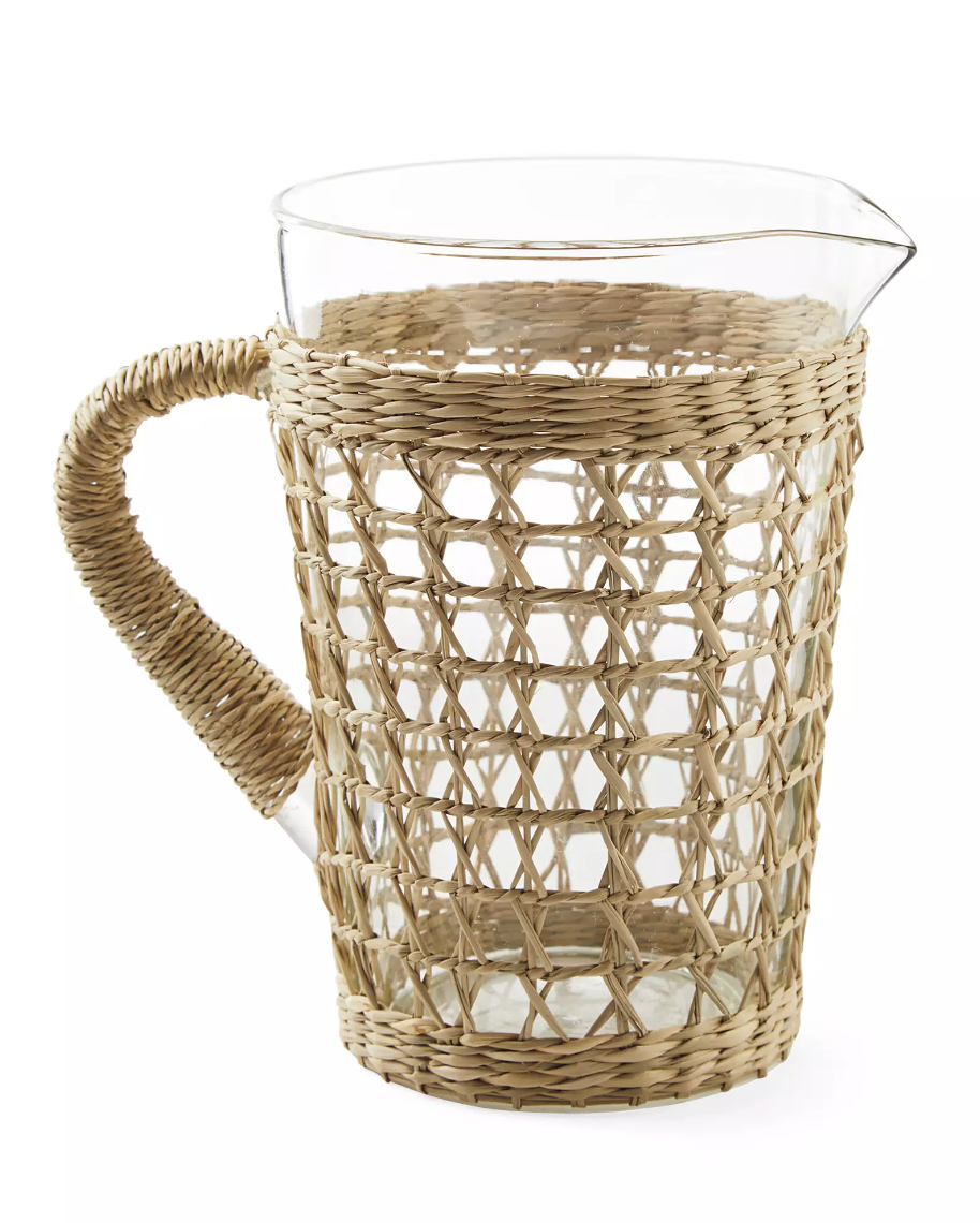 <p><a href="https://go.redirectingat.com?id=74968X1596630&url=https%3A%2F%2Fwww.serenaandlily.com%2Fproducts%2Fcayman-seagrass-wrapped-pitcher%2F448379&sref=https%3A%2F%2F" rel="nofollow noopener" target="_blank" data-ylk="slk:Shop Now;elm:context_link;itc:0;sec:content-canvas" class="link ">Shop Now</a></p><p>Cayman Seagrass-Wrapped Pitcher</p><p>$38.00</p><p>serenaandlily.com</p><span class="copyright">Serena & Lily</span>