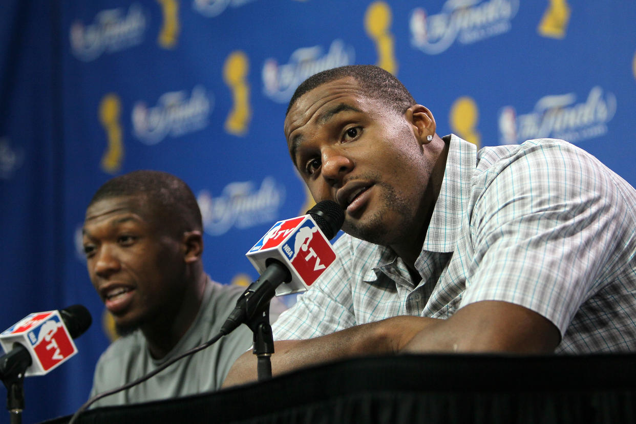 BOSTON - JUNE 10:  Nate Robinson #4 and Glen Davis #11 of the Boston Celtics speak to the media after the Celtics defeated the Los Angeles Lakers during Game Four of the 2010 NBA Finals on June 10, 2010 at TD Garden in Boston, Massachusetts. NOTE TO USER: User expressly acknowledges and agrees that, by downloading and/or using this Photograph, user is consenting to the terms and conditions of the Getty Images License Agreement.  (Photo by Jim Rogash/Getty Images)