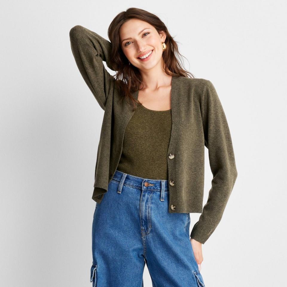 <p><a href="https://www.target.com/p/women-39-s-cardigan-a-new-day-8482-olive-green-m/-/A-88226419" rel="nofollow noopener" target="_blank" data-ylk="slk:Shop Now;elm:context_link;itc:0;sec:content-canvas" class="link ">Shop Now</a></p><p>Cropped Cardigan </p><p>target.com</p><p>$25.00</p><span class="copyright">A New Day</span>