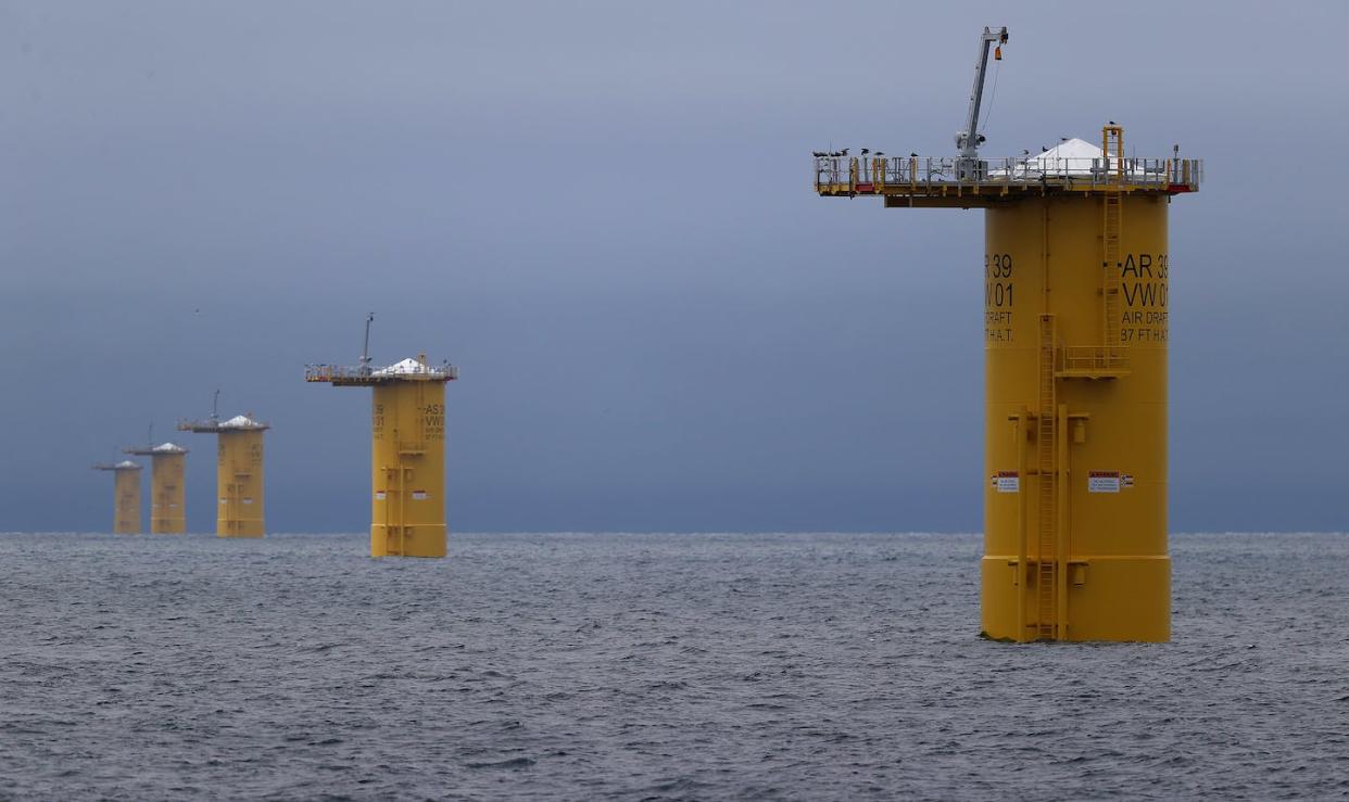 A row of monopiles that will be the base for offshore wind turbines, in the Atlantic Ocean off the coast of Martha's Vineyard, Mass. <a href="https://www.gettyimages.com/detail/news-photo/new-bedford-ma-a-row-of-mono-piles-that-will-be-the-base-news-photo/1623091024" rel="nofollow noopener" target="_blank" data-ylk="slk:David L Ryan/The Boston Globe via Getty Images;elm:context_link;itc:0;sec:content-canvas" class="link ">David L Ryan/The Boston Globe via Getty Images</a>