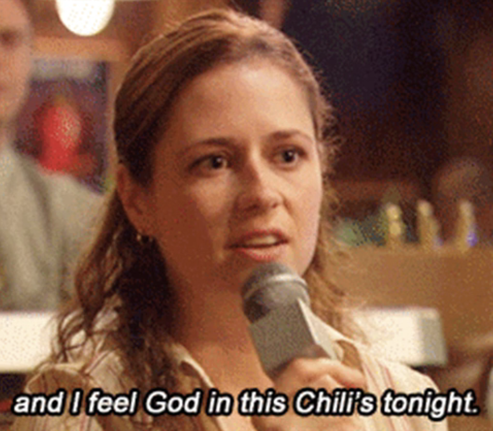 woman with a mic saying, and i feel god in this chili's tonight