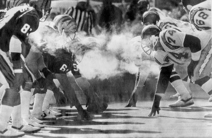 JANUARY 10, 1982: Linemen for the Cincinnati Bengals, left, and the San Diego Chargers line up in sub-zero temperatures during the AFC Championship Game on January 10, 1982, in what was dubbed &quot;The Freezer Bowl&quot; at Riverfront Stadium. Playing in 9 below zero temperatures and wind gusting to 40 miles per hour, the Bengals downed the Chargers 27-7.
