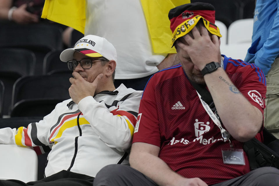 German soccer supporters reacts after the World Cup group E soccer match between Costa Rica and Germany at the Al Bayt Stadium in Al Khor , Qatar, Friday, Dec. 2, 2022. (AP Photo/Martin Meissner)