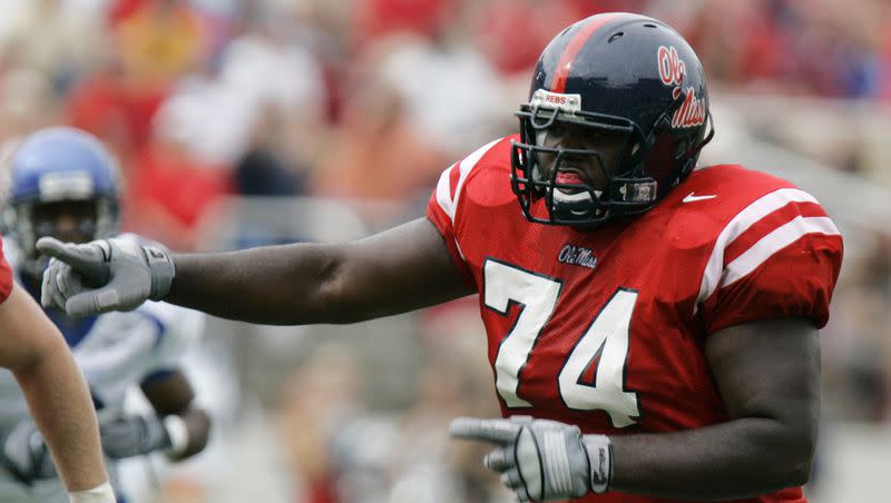 In this 2006 file photo, Mississippi left tackle Michael Oher (74) gestures downfield during a college football game against Memphis in Oxford, Miss. Oher is the subject of the movie, “The Blind Side.”