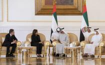 In this photo made available by Ministry of Presidential Affairs, U.S. Vice President Kamala Harris, second left, offers her condolences to Sheikh Mohamed bin Zayed Al Nahyan, president of the UAE and ruler of Abu Dhabi, second right first row, on the passing of Sheikh Khalifa bin Zayed Al Nahyan, late president of the UAE, in Abu Dhabi, UAE, Monday, May 16, 2022. U.S. Secretary of State, Antony Blinken, left, looks on. (Abdulla Al Neyadi/Ministry of Presidential Affairs via AP)