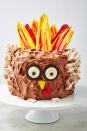 <p>Have you ever seen a cake so adorable? Impress your family with this super easy, super cute <a href="https://www.delish.com/holiday-recipes/thanksgiving/g2574/holiday-pies-desserts-recipes/" rel="nofollow noopener" target="_blank" data-ylk="slk:Thanksgiving dessert;elm:context_link;itc:0;sec:content-canvas" class="link ">Thanksgiving dessert</a>! The feathers are made by brushing white chocolate onto parchment paper and then chilled until hardened. Use your favorite cake mix or use boxed to keep it simple like we did.</p><p>Get the <strong><a href="https://www.delish.com/holiday-recipes/thanksgiving/a29505453/turkey-cake-recipe/" rel="nofollow noopener" target="_blank" data-ylk="slk:Turkey Cake recipe;elm:context_link;itc:0;sec:content-canvas" class="link ">Turkey Cake recipe</a></strong>.</p>