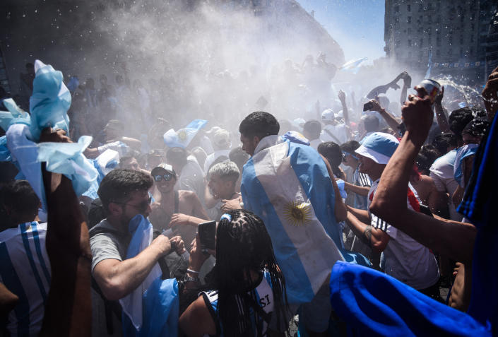 Soccer Football - FIFA World Cup Final Qatar 2022 - Fans in Buenos Aires watch Argentina v France - Buenos Aires, Argentina - December 18, 2022 Argentina fans celebrate in Buenos Aires after winning the World Cup REUTERS/Mariana Nedelcu