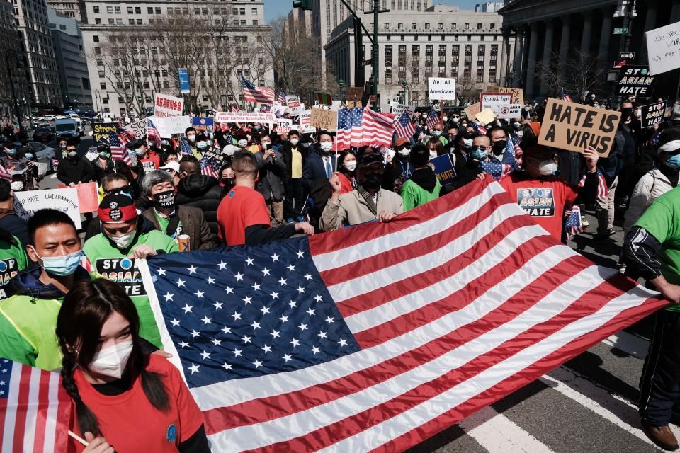 People participate in a protest to demand an end to anti-Asian violence on April 4, 2021, in New York City.