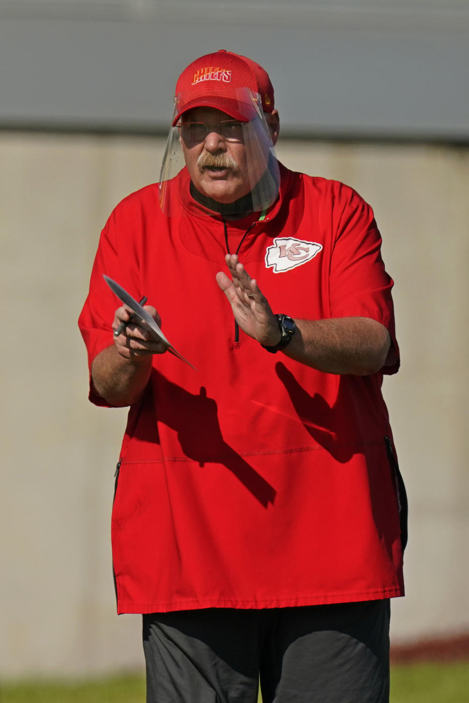 Kansas City Chiefs head coach Andy Reid watches a drill during an NFL football training camp Saturday, Aug. 15, 2020, in Kansas City, Mo. (AP Photo/Charlie Riedel)