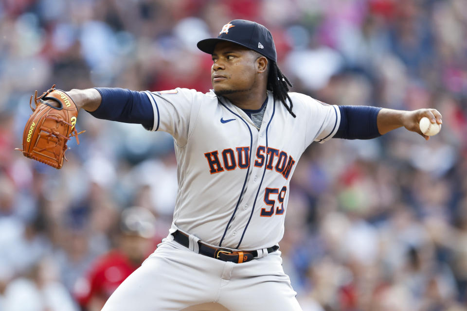 Houston Astros starting pitcher Framber Valdez delivers against the Cleveland Guardians during the first inning of a baseball game Friday, Aug. 5, 2022, in Cleveland. (AP Photo/Ron Schwane)