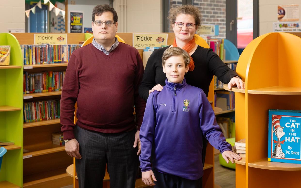 Tony and Kate Perry with their son Norman, aged 10, at his school LVS Ascot. Tony has launched a campaign opposing Labour's VAT raid on independent education