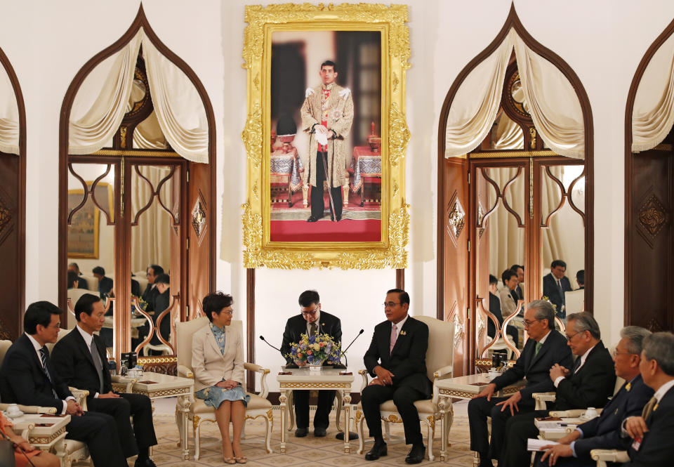 Hong Kong Chief Executive Carrie Lam, center left, meets Thailand's Prime Minister Prayuth Chan-ocha, center right, at the government house in Bangkok, Thailand Friday, Nov. 29, 2019. (Jorge Silva/Pool Photo via AP)