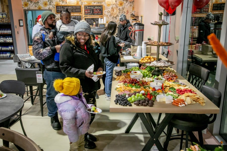 The Angel Tree Christmas Party at Talsma Furniture near Grand Rapids on Nov. 30, 2023. (Michael Buck/WOOD TV8)