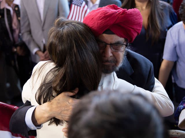<p>LOGAN CYRUS/AFP/Getty</p> Nikki Haley embraces her father Ajit Singh Randhawa during a campaign event to launch her presidential bid on February 15, 2023 in Charleston, South Carolina.