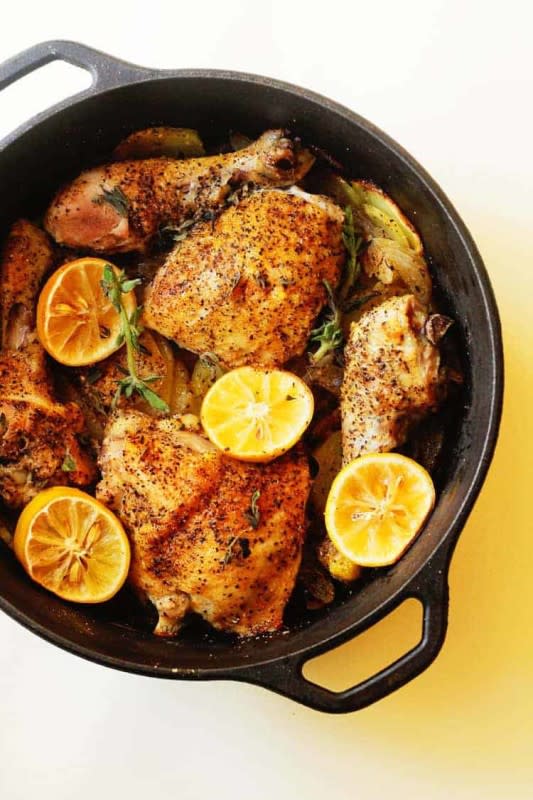 <p>Grandbaby Cakes</p><p>This lemon roast chicken dinner starts with fresh chicken that is highly seasoned and sprinkled with a citrus flavor that’s roasted in delicious juices, onions and potatoes making this the easiest weeknight dinner!</p><p><strong>Get the Recipe: </strong><a href="https://grandbaby-cakes.com/lemon-roasted-chicken/" rel="nofollow noopener" target="_blank" data-ylk="slk:Lemon Roast Chicken Dinner;elm:context_link;itc:0;sec:content-canvas" class="link "><strong>Lemon Roast Chicken Dinner</strong></a></p>