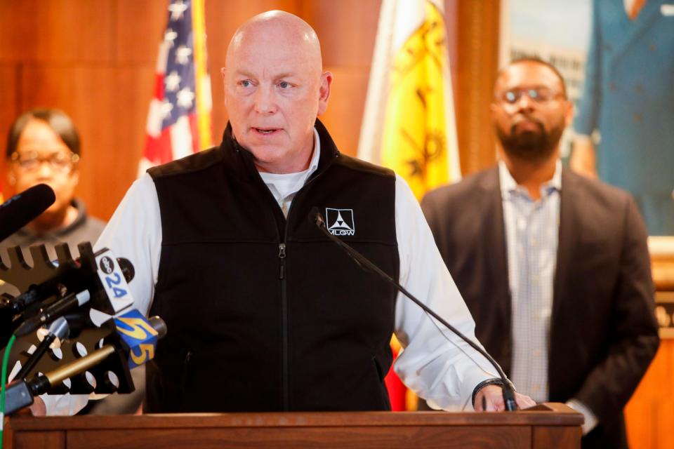 Memphis Light, Gas and Water President and CEO Doug McGowen speaks at a press conference with Mayor Paul Young behind him to discuss the upcoming colder weather, preparations the city and MLGW are taking and what residents can do to stay safe at city hall on Friday, January 12, 2024.