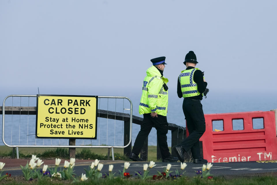 Police officers close a car park in Whitley Bay, Northumberland, as the UK continues in lockdown to help curb the spread of the coronavirus. (Photo by Owen Humphreys/PA Images via Getty Images)