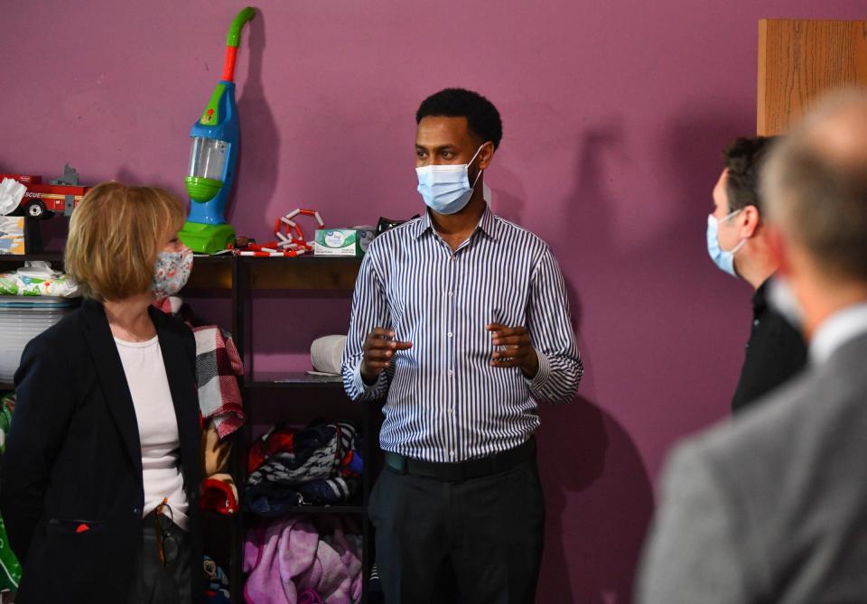 Owner Adbi Daisane talks with Sen. Tina Smith during a tour of Blooming Kids Child Care Center Friday, June 4, 2021, in St .Cloud.