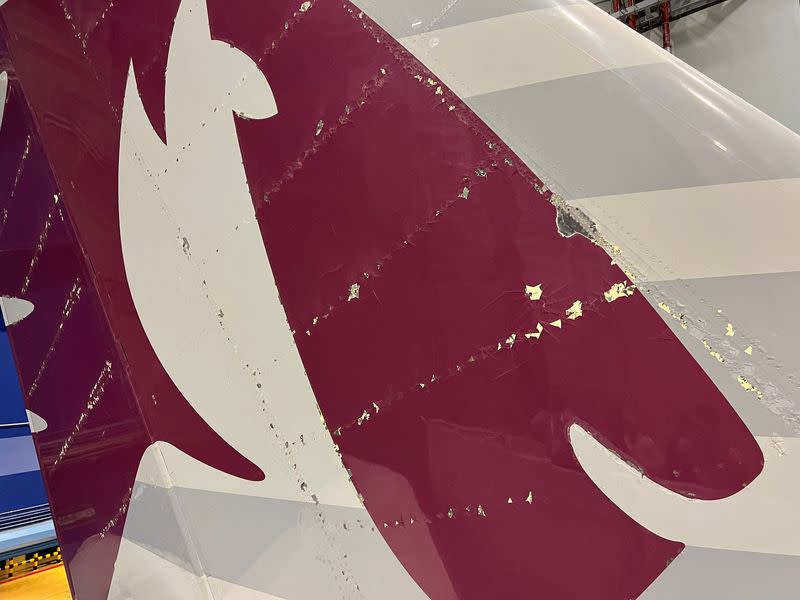 FILE PHOTO: Surface damage seen on Qatar Airways' airbus A350 parked at Qatar airways aircraft maintenance hangar in Doha