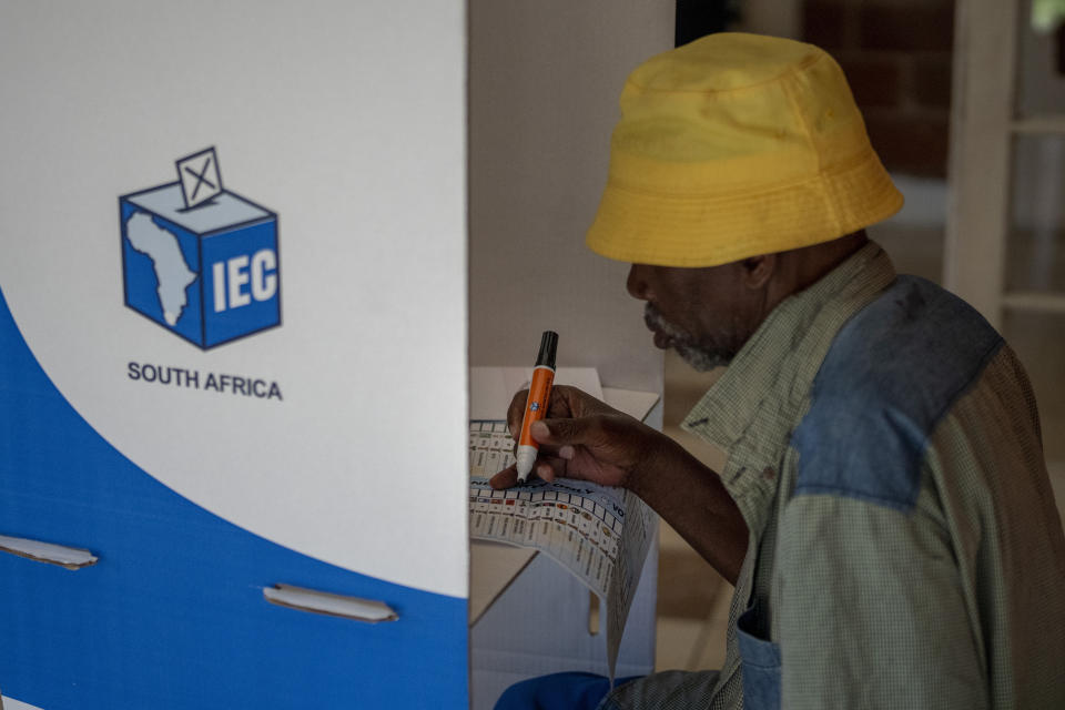 A man fills out a ballot paper before casting it during an especial voting day at Zibambeleni old age home in KwaDadeka, near Durban, South Africa, Monday, May 27, 2024. South Africans who received special permission to vote early were casting their ballots on Monday, ahead of main elections on May. 29. The special voting is for registered voters who are unable to travel to a voting station because of physical challenges such as disability, pregnancy or advanced age. (AP Photo/Emilio Morenatti)