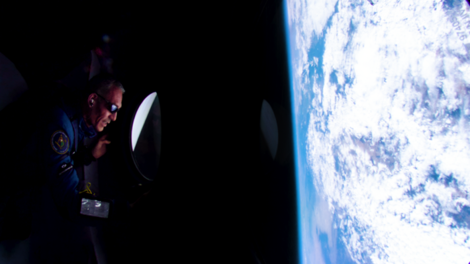 An Italian researcher views the Earth from the edge of space on Virgin Galactic’s first commercial spaceflight in July, which was not open to the public (Virgin Galactic)