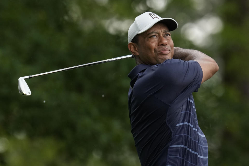 Tiger Woods watches his tee shot on the fourth hole during the second round of the Masters golf tournament at Augusta National Golf Club on Friday, April 7, 2023, in Augusta, Ga. (AP Photo/Mark Baker)