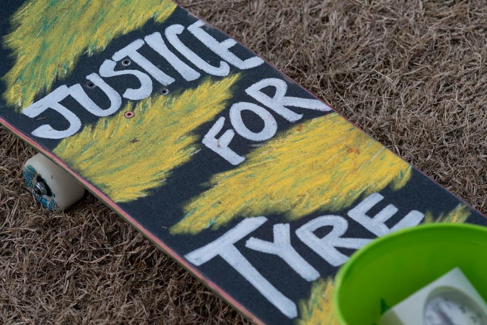 A skateboard with "Justice for Tyre" rests on the lawn at Public Square Park Saturday, Feb. 4, 2023 in Nashville, Tenn. Black Nashville Assembly holds a vigil for Tyre Nichols and others killed by police. 