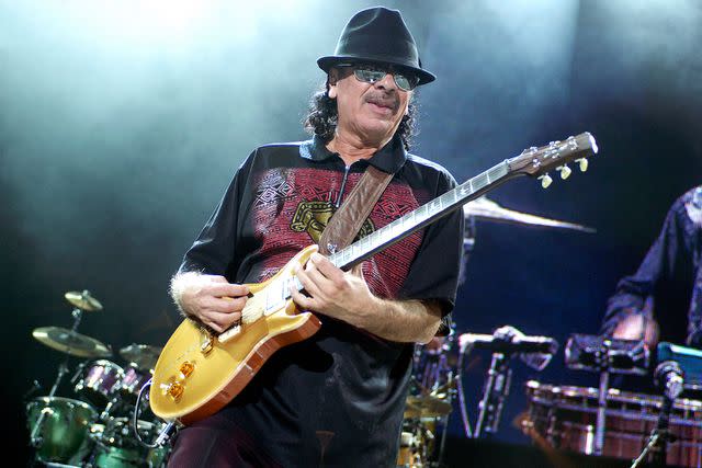 Tim Mosenfelder/Getty Carlos Santana performs in October 2018 in California