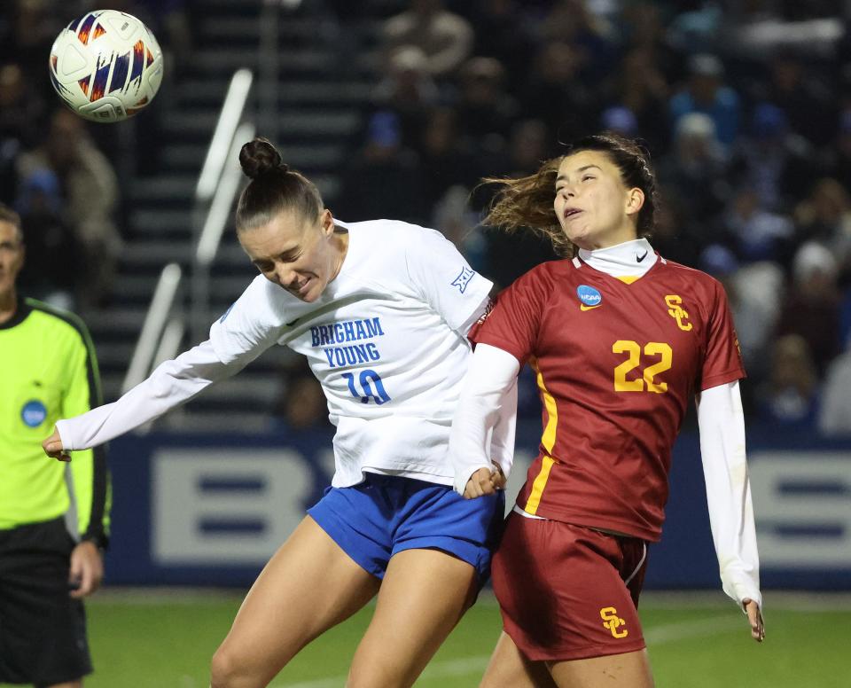 BYU midfielder Olivia Katoa (10) heads the ball against USC midfielder Helena Sampaio (22) during the second round of the NCAA championship in Provo on Thursday, Nov. 16, 2023. BYU won 1-0. | Jeffrey D. Allred, Deseret News
