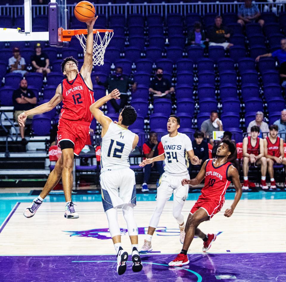 Columbus’s Cameron Boozer blocks a shot put up SFCA’s Yadniel Sanabria during the Hugh Thimlar basketball game at the City of Palms Classic. Columbus won.  