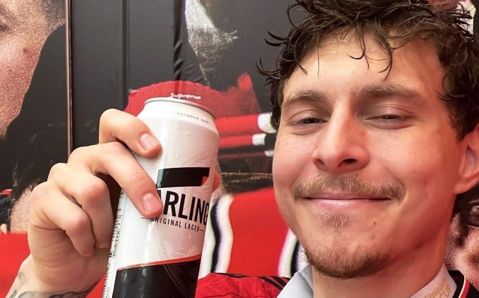 Victor Lindelof with a can of Carling