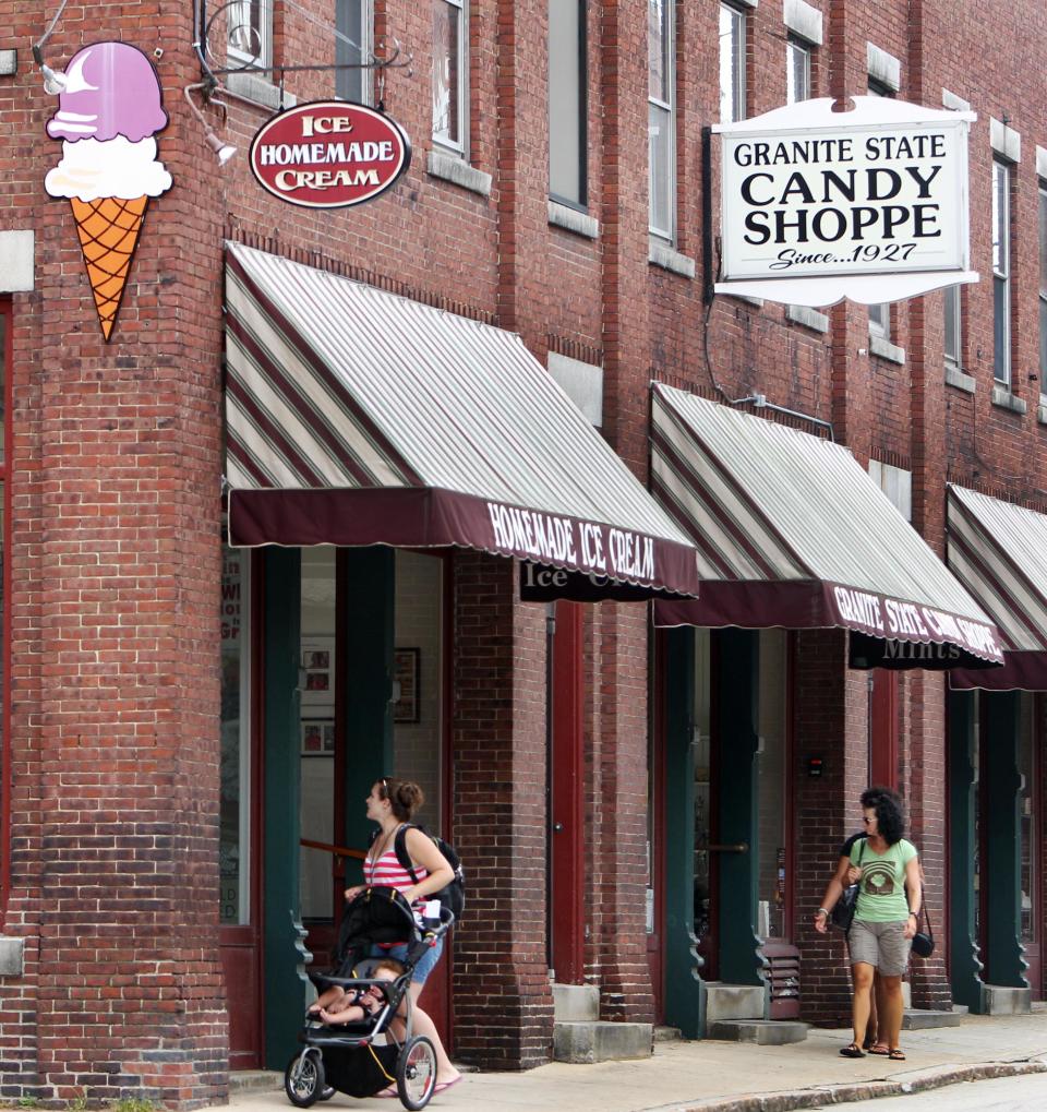 In this photo taken Thursday, July 11, 2013, the Granite State Candy Shoppe is seen in Concord, N.H. The old-time shop has been a family operation since 1927. A gaggle of eateries, an independent movie theater, several charming (and killer good) bakeries and a kick-butt independent bookstore has turned Concord into a must-stop for folks headed north for the lakes and mountains. (AP Photo/Jim Cole)