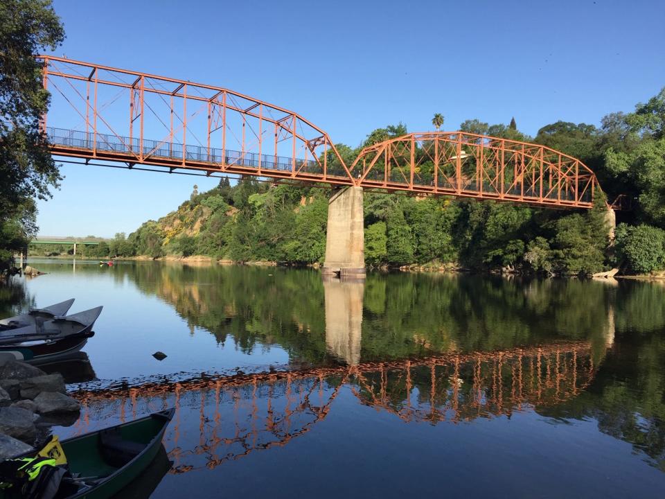 The historic Fair Oaks Bridge, circa 1907, crosses the American at Fair Oaks.