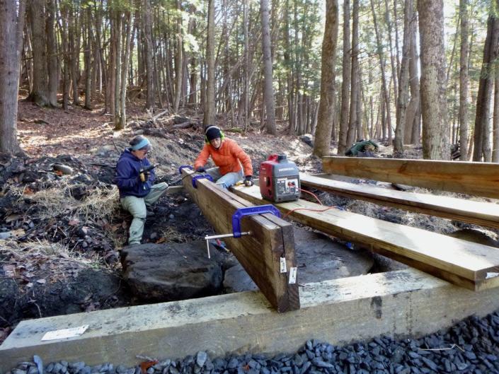 Volunteers help with construction of the Cross Vermont Trail.