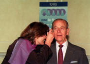 <p>The Duke of Edinburgh has his ears examined as he tries the facilities with a hearing test, during a visit to the Royal National Institute for Deaf People in London. The Duke, Patron of the Institute, was there to unveil a plaque to commemorate the founding of the organisation. (Photo credit: JOHN STILLWELL/PA Archive/PA Images) </p>