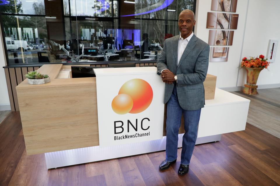 Black News Channel Co-founder J.C. Watts stands in the lobby of the news network Tuesday, Jan. 8, 2020.  