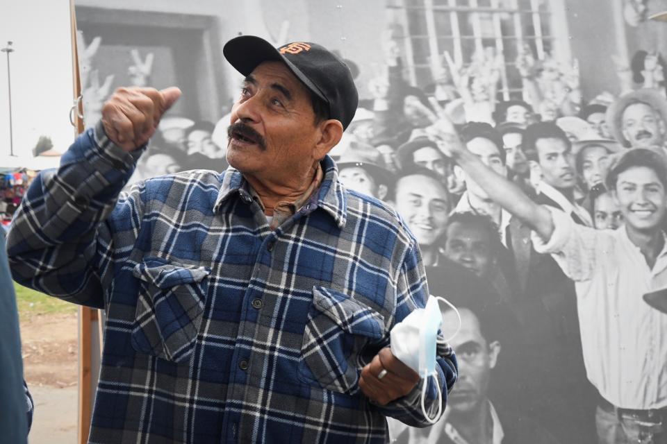 Heraclio Virgen reminisces his days as a Bracero during a Bracero photo display at the Salinas Sports Complex in Salinas.