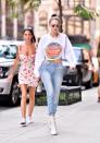 <p>G put a throwback spin on her signature crop top-jeans-booties equation. She rocked an old-school Nickelodeon Studios sweatshirt that my 9-year-old self would have killed for. </p>