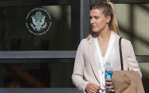 Eugenie Bouchard leaves Brooklyn Federal court, Wednesday, Feb. 21, 2018, in New York. Bouchard testified during a negligence lawsuit  - Credit: AP