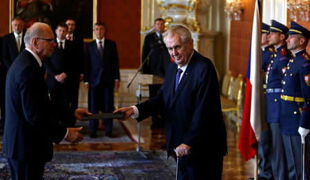 Czech Republic's President Milos Zeman (R) appoints Ivan Pilny as the new Finance Minister at Prague Castle in Prague, Czech Republic, May 24, 2017. REUTERS/David W Cerny