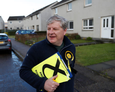 The SNP's deputy leader Angus Robertson campaigns in Elgin, Moray, Scotland, Britain May 18, 2017. Picture taken May 18, 2017. REUTERS/Russell Cheyne