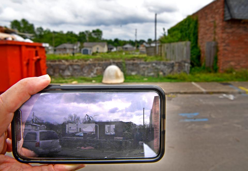 Shortly after a tornado struck, Michael Warren took a photo on his phone of a house that was destroyed across the street from a house he owns. The house has been torn down and now the lot is empty on Tuesday, May 26, 2020.