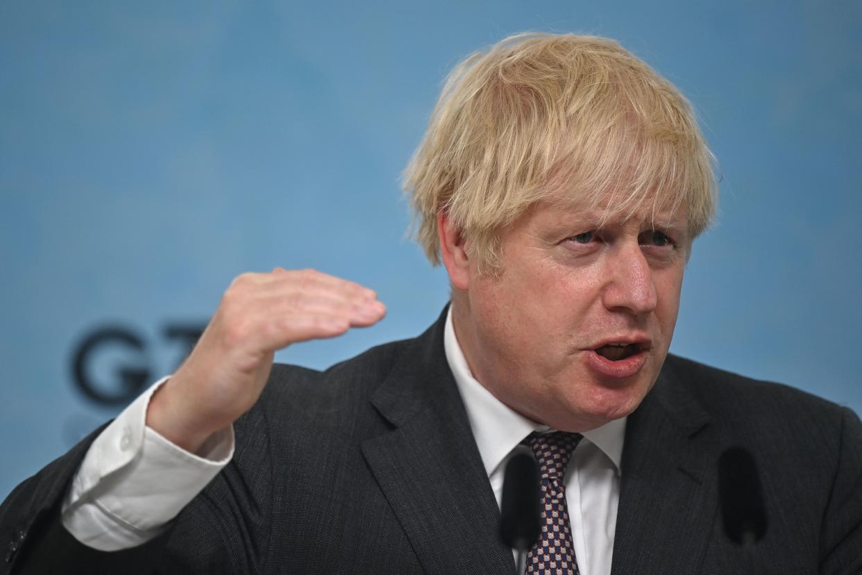 Britain's Prime Minister Boris Johnson takes part in a press conference on the final day of the G7 summit in Carbis Bay, Cornwall on June 13, 2021. (Photo by Ben STANSALL / various sources / AFP) (Photo by BEN STANSALL/AFP via Getty Images)